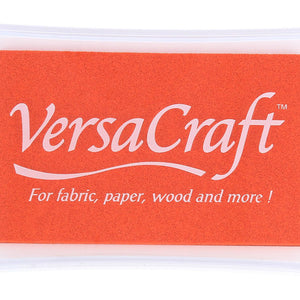 Tinta naranja para tejidos marca Verscraft en almohadilla